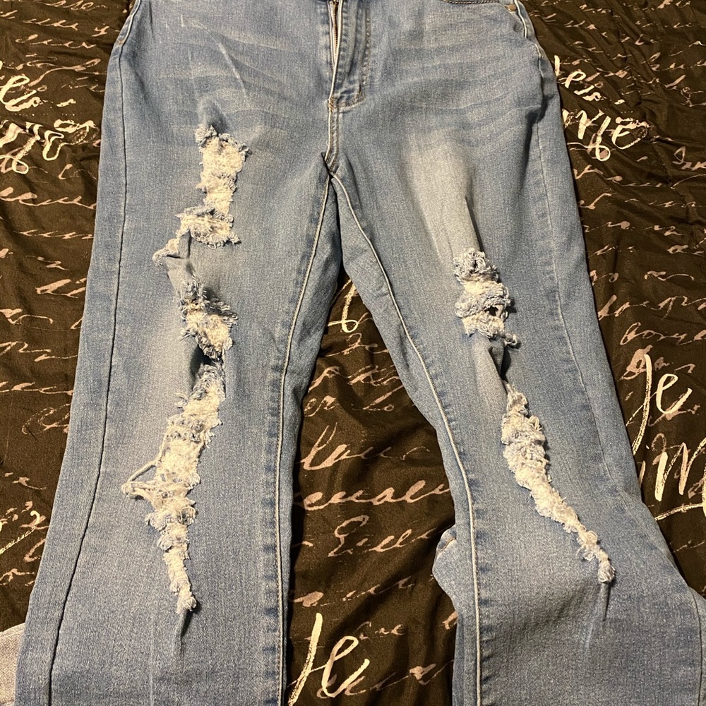 distressed mid rise skinny jeans